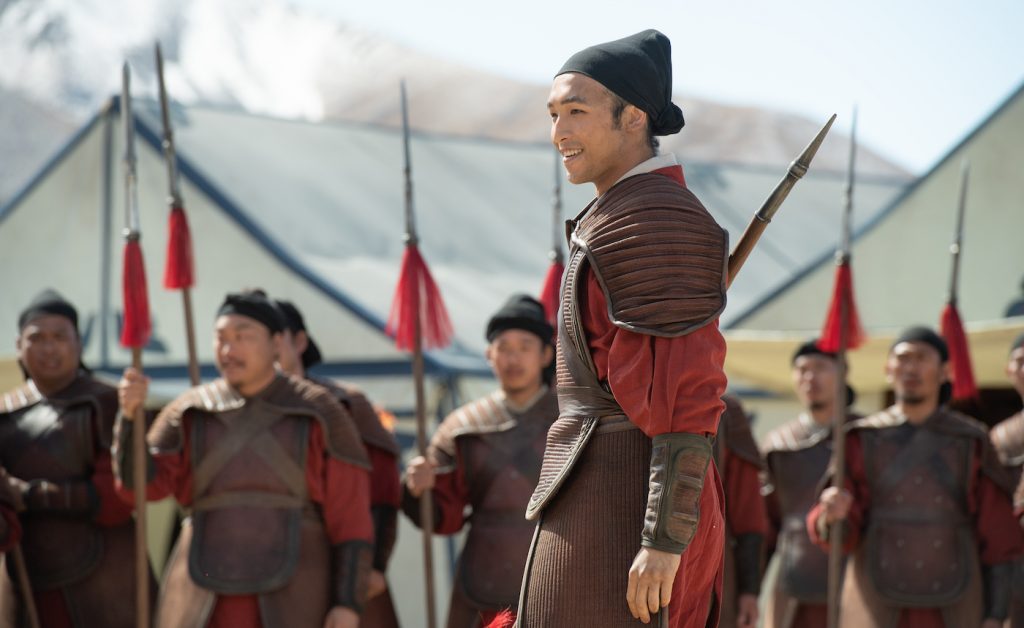 Yoson An as Honghui in Disney's MULAN. Photo by Jasin Boland. © 2020 Disney Enterprises, Inc. All Rights Reserved.