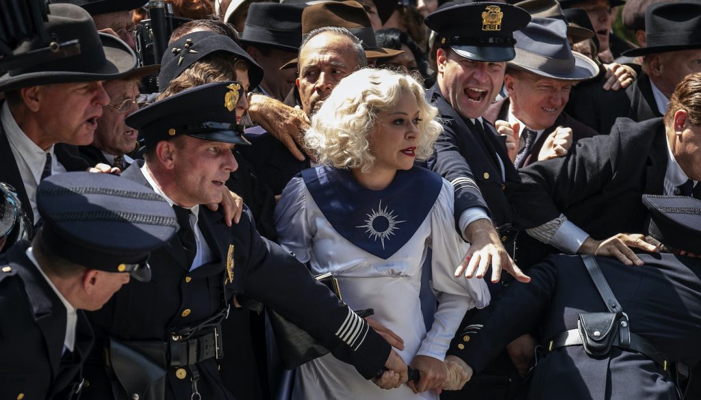 Actress Tatiana Maslany (Sister Alice) surrounded by background artists as LAPD police officers and crowd in the show’s second episode. Courtesy HBO