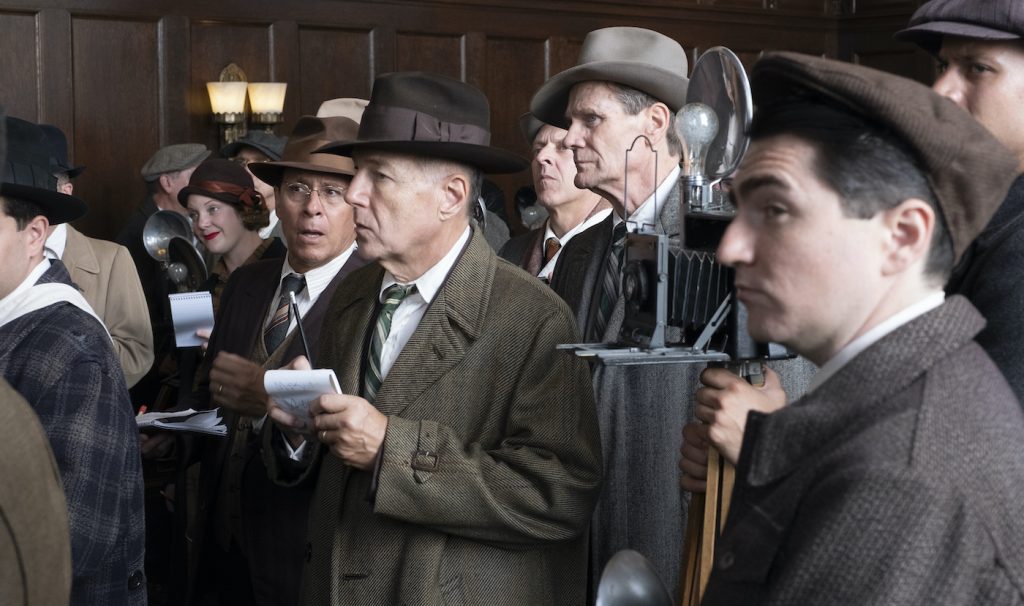 Background actors at work in the Courtroom set on Paramount’s Stage 27. Photo by Merrick Morton/HBO. 