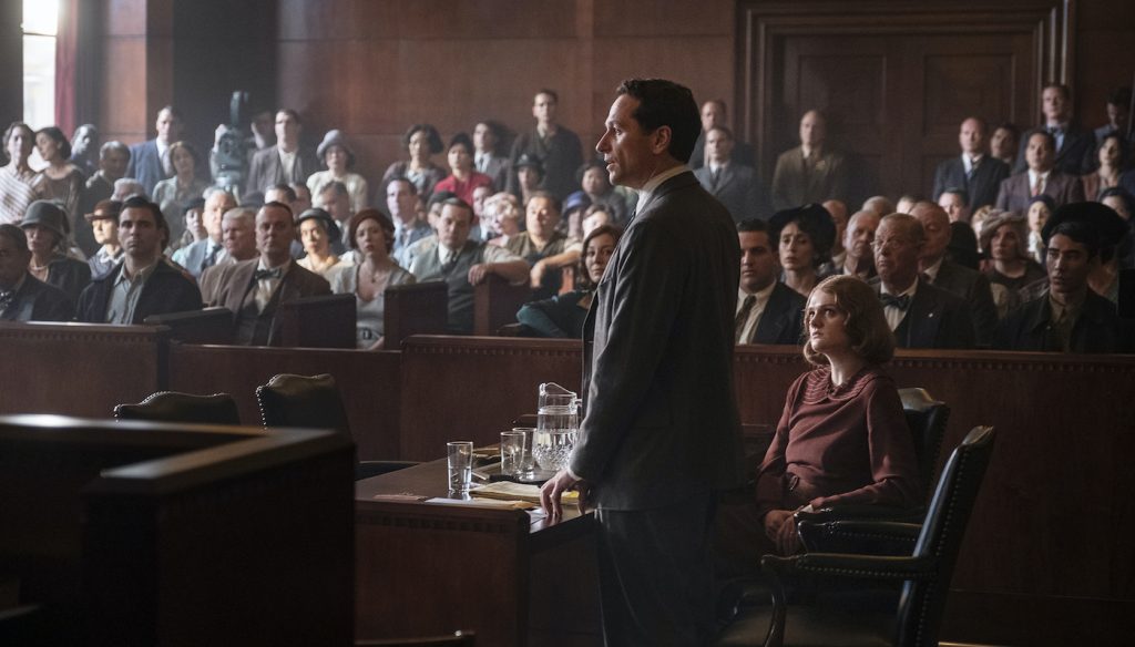 Perry Mason (Matthew Rhys) addresses the jury, as his client, Emily Dodson (Gayle Rankin) watches, along with additional primary cast in front rows and 200 background.  With numerous Courtroom day shoots, background actors, who appear in each scene, find plentiful employment on series with consistent repeat background requirements