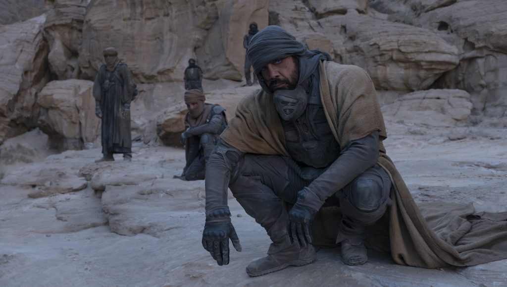 Caption: (Front) JAVIER BARDEM as Stilgar in Warner Bros. Pictures’ and Legendary Pictures’ action adventure “DUNE,” a Warner Bros. Pictures and Legendary release. Photo Credit: Chiabella James