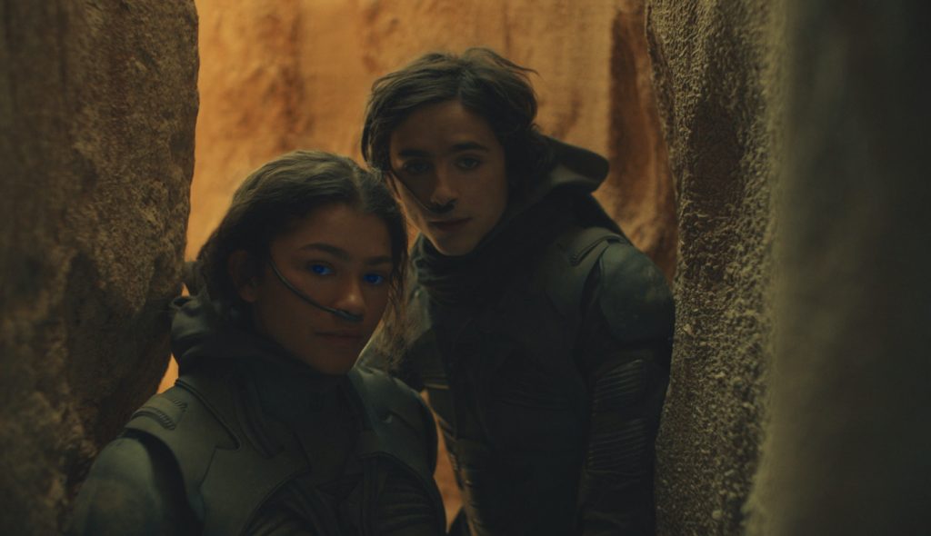 Caption: (L-r) ZENDAYA as Chani and TIMOTHÉE CHALAMET as Paul Atreides in Warner Bros. Pictures’ and Legendary Pictures’ action adventure “DUNE,” a Warner Bros. Pictures and Legendary release. Photo Credit: Courtesy of Warner Bros. Pictures and Legendary Pictures