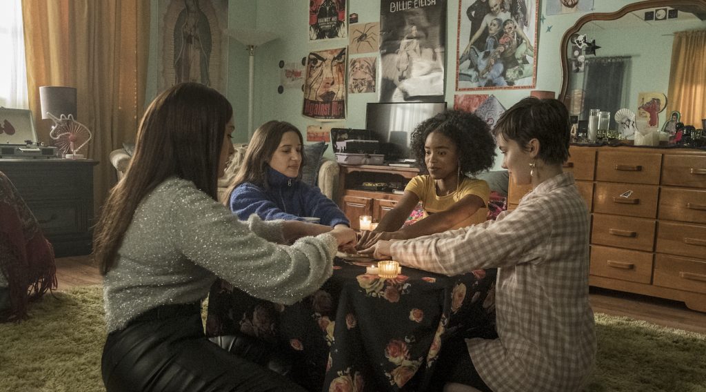 (l-r) Lourdes (Zoey Luna) Frankie (Gideon Adlon) Tabby (Lovie Simone) and Lily (Cailee Spaeny) perform rituals and talk about being cautious with their gifts in Columbia Pictures' THE CRAFT: LEGACY. Photo by Rafy Photography.