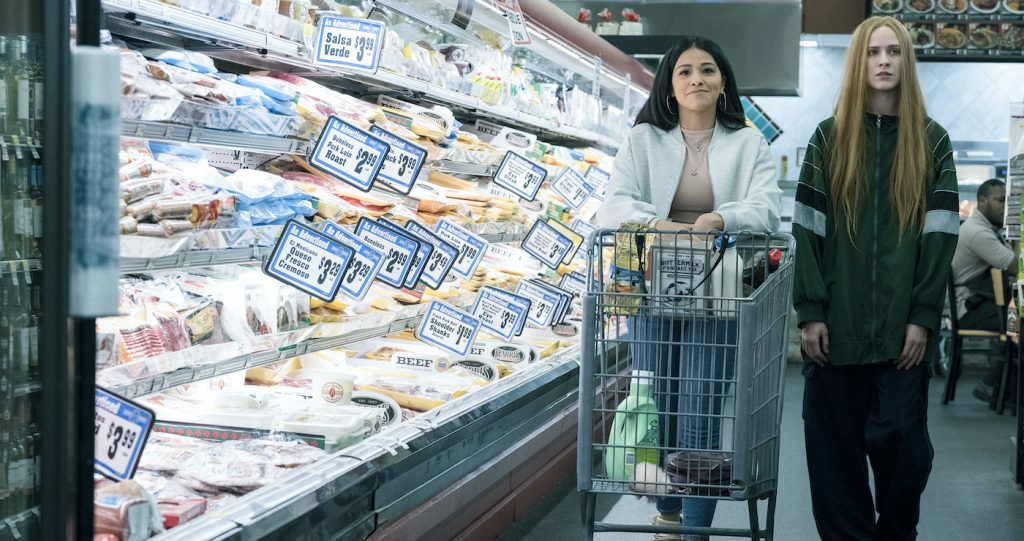 Gina Rodriguez (left) stars as "Melanie" and Evan Rachel Wood (right) stars as "Old Dolio Dyne" in director Miranda July's KAJILLIONAIRE, a Focus Features release. Credit: Matt Kennedy / Focus Features