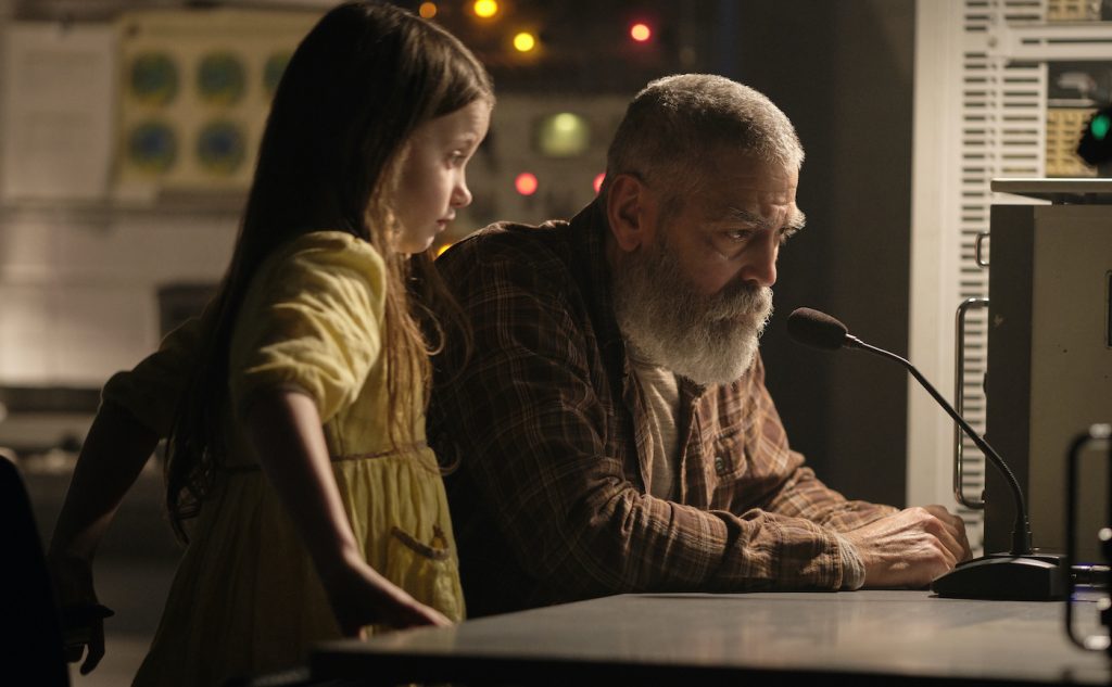 Caoilinn Springall as Iris and George Clooney as Augustine. Cr. Philippe Antonello/NETFLIX ©2020