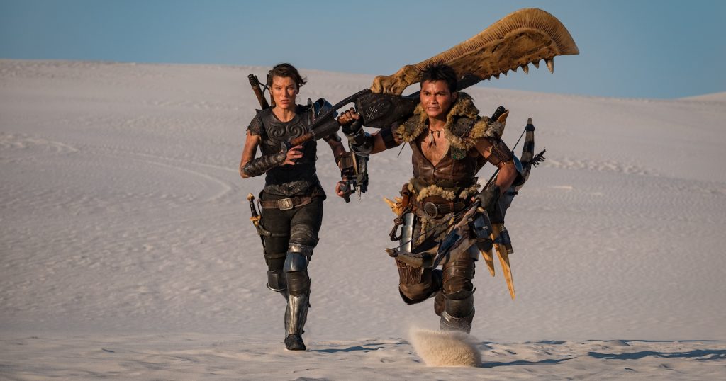 Milla Jovovich and Tony Jaa in 'Monster Hunter.' Photo Credit: Coco Van Oppens Photography; ©CONSTANTIN FILM Produktion Services GmbH- Photos Coco Van Oppens