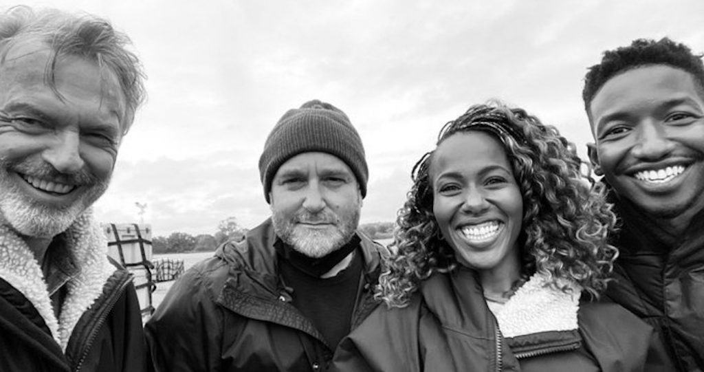 L-r: Sam Neill, Colin Trevorrow, DeWanda Wise, and Mamoudou Athie on set. Courtesy Universal Pictures.