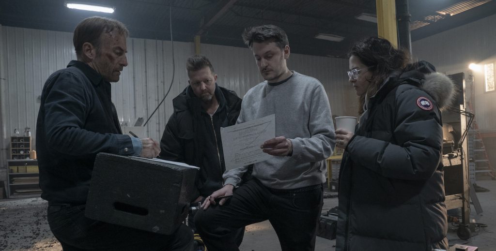 (from left) Bob Odenkirk, producer David Leitch, director Ilya Naishuller and producer Kelly McCormick on the set of Nobody. Photo Credit: Allen Fraser/Universal Pictures