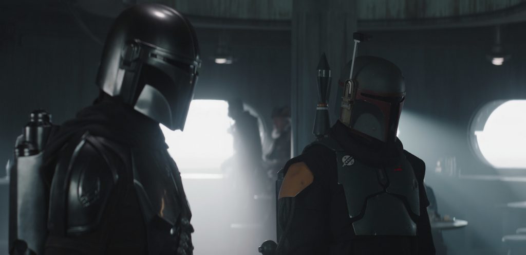 L-r: The Mandalorian (Pedro Pascal) and Boba Fett (Temuera Morrison) in Lucasfilm's THE MANDALORIAN, season two, exclusively on Disney+. Courtesy Lucasfilm Ltd.