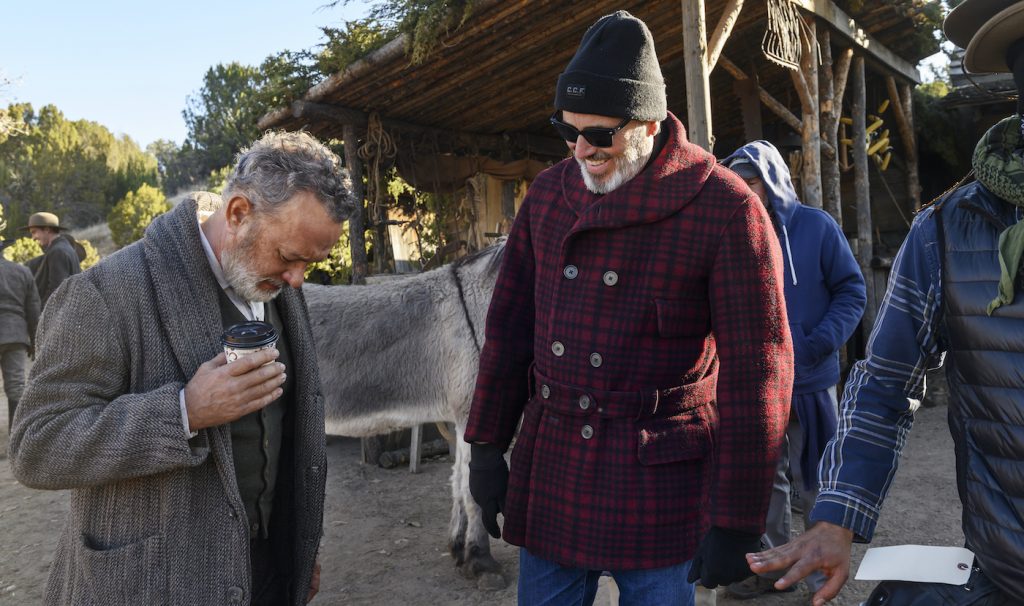 L-r: Tom Hanks and Mark Bridges on the set of "News of the World." Courtesy Universal Pictures.