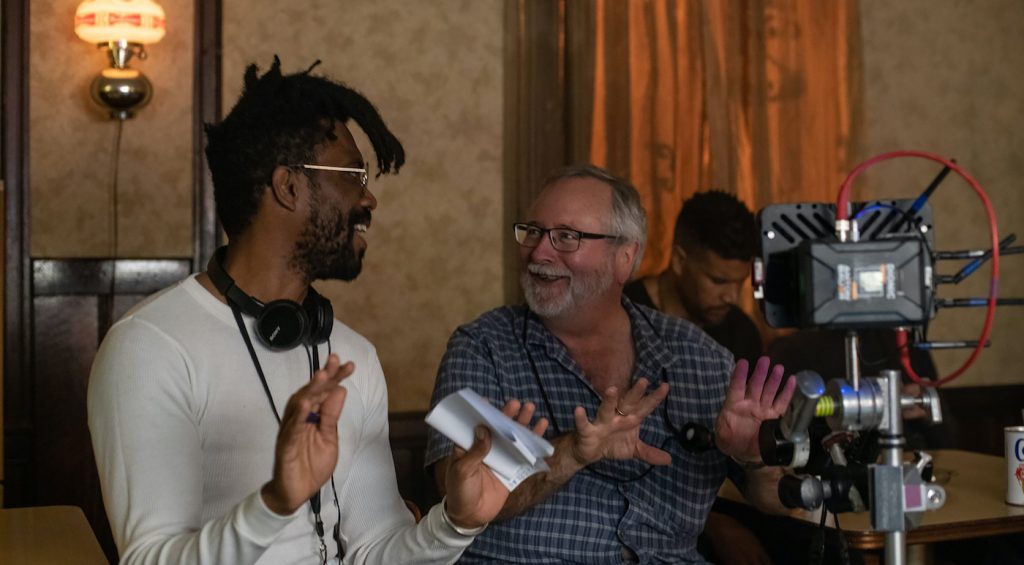 L-r: Director Shaka King and cinematographer Sean Bobbitt. Courtesy Warner Bros.