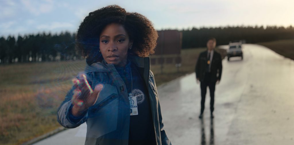 L-R: Teyonah Parris as Monica Rambeau and Randall Park as Jimmy Woo in Marvel Studios' WANDAVISION. Courtesy Marvel Studios.