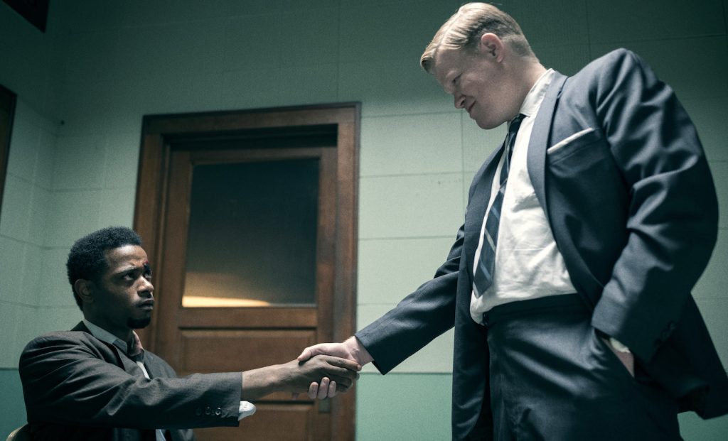 Caption: (L-r) LAKEITH STANFIELD as Bill O’Neal and JESSE PLEMONS as Roy Mitchell in Warner Bros. Pictures’ “JUDAS AND THE BLACK MESSIAH,” a Warner Bros. Pictures release. Photo Credit: Glen Wilson