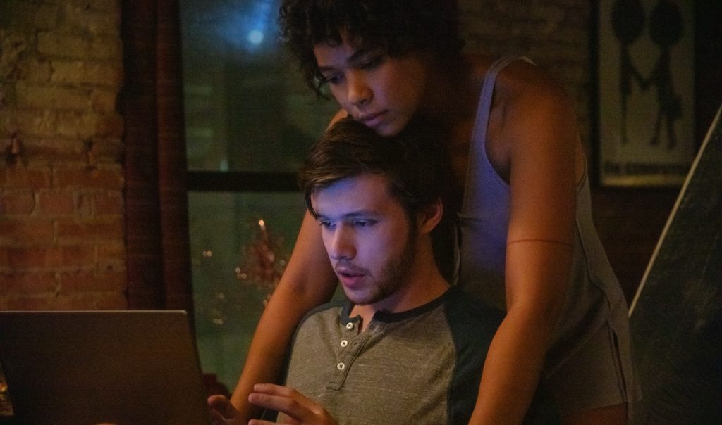 Nick Robinson as Ross Ulbricht and Alexandra Shipp as Julia in Silk Road. Photo Credit: Catherine Kanavy