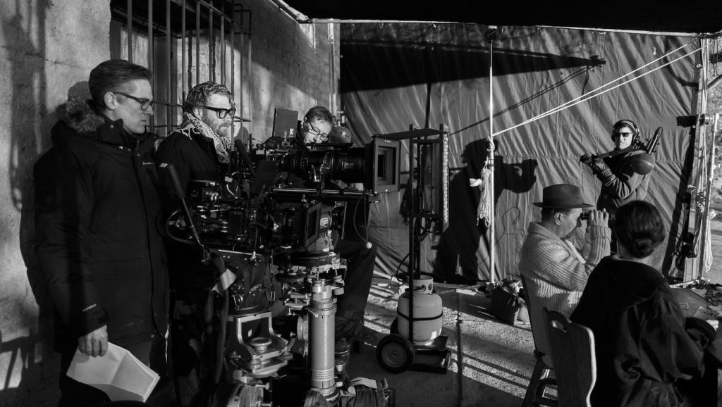 Messerschmidt (with glasses) and team with a pair of RED Digital Cinema black and white Dragon-X cameras L-R: B Camera Operator Will Dearborn, Messerschmidt, A Camera Operator Brian Osmond, Boom Operator Michael Primmer. (Photo: Miles Crist/NETFLIX)