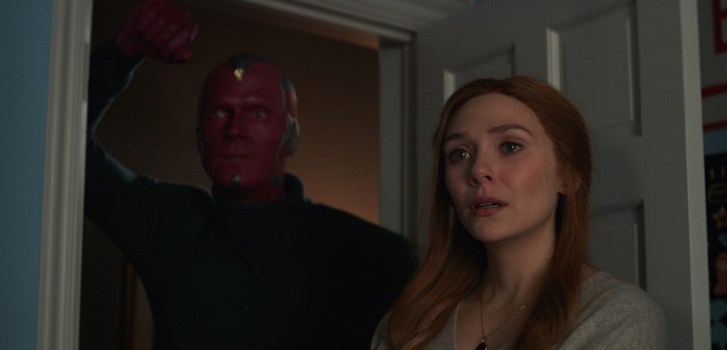 (L-r): Paul Bettany as Vision and Elizabeth Olsen as Wanda Maximoff in Marvel Studios' WandaVision, exclusively on Disney+. Photo courtesy of Marvel Studios.