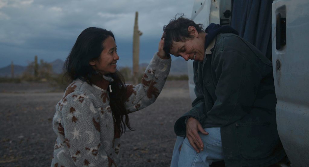 Director/Writer/Editor/Producer Chloé Zhao and Frances McDormand on the set of NOMADLAND. Photo by Joshua James Richards. © 2020 20th Century Studios All Rights Reserved