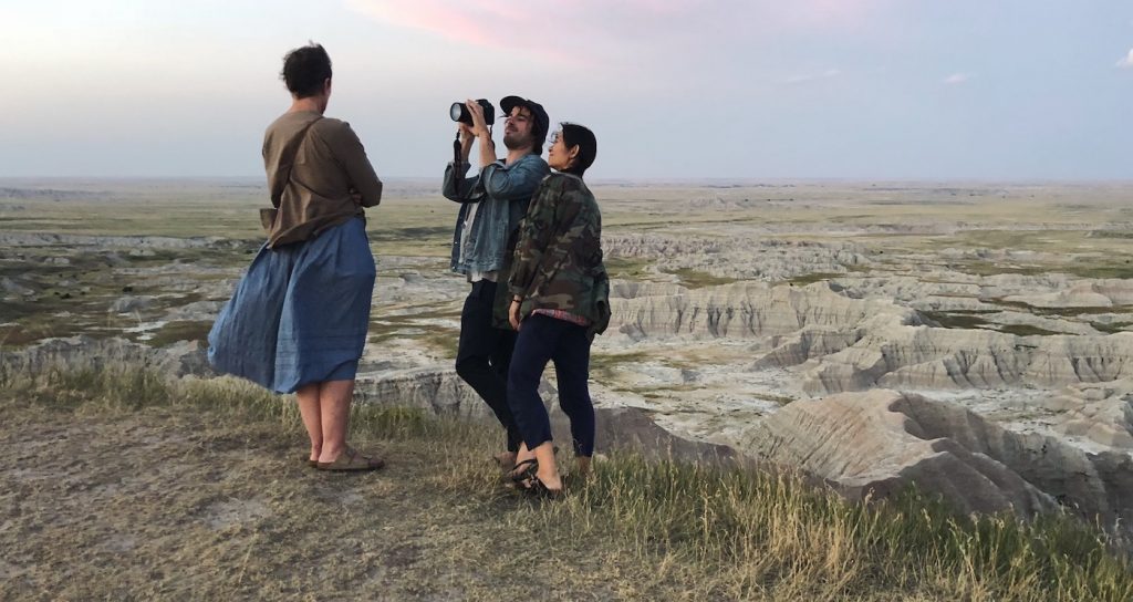 (From L-R): Frances McDormand, Cinematographer Joshua James Richards and Director/Writer/Editor/Producer Chloé Zhao on the set of NOMADLAND. Photo Courtesy of Searchlight Pictures © 2020 20th Century Studios All Rights Reserved