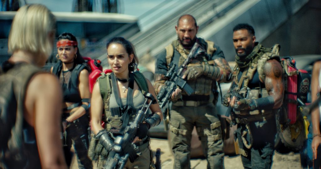 ARMY OF THE DEAD - (L-R) NORA ARNEZEDER as LILLY, SAMANTHA WIN as CHAMBERS, ANA DE LA REGUERA as CRUZ, DAVE BAUTISTA as SCOTT WARD and OMARI HARDWICK as VANDEROHE. Cr: NETFLIX © 2021