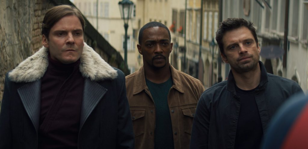 (L-R): Zemo (Daniel Brühl), Falcon/Sam Wilson (Anthony Mackie) and Winter Soldier/Bucky Barnes (Sebastian Stan) in Marvel Studios' THE FALCON AND THE WINTER SOLDIER exclusively on Disney+. Photo courtesy of Marvel Studios. ©Marvel Studios 2021. All Rights Reserved.