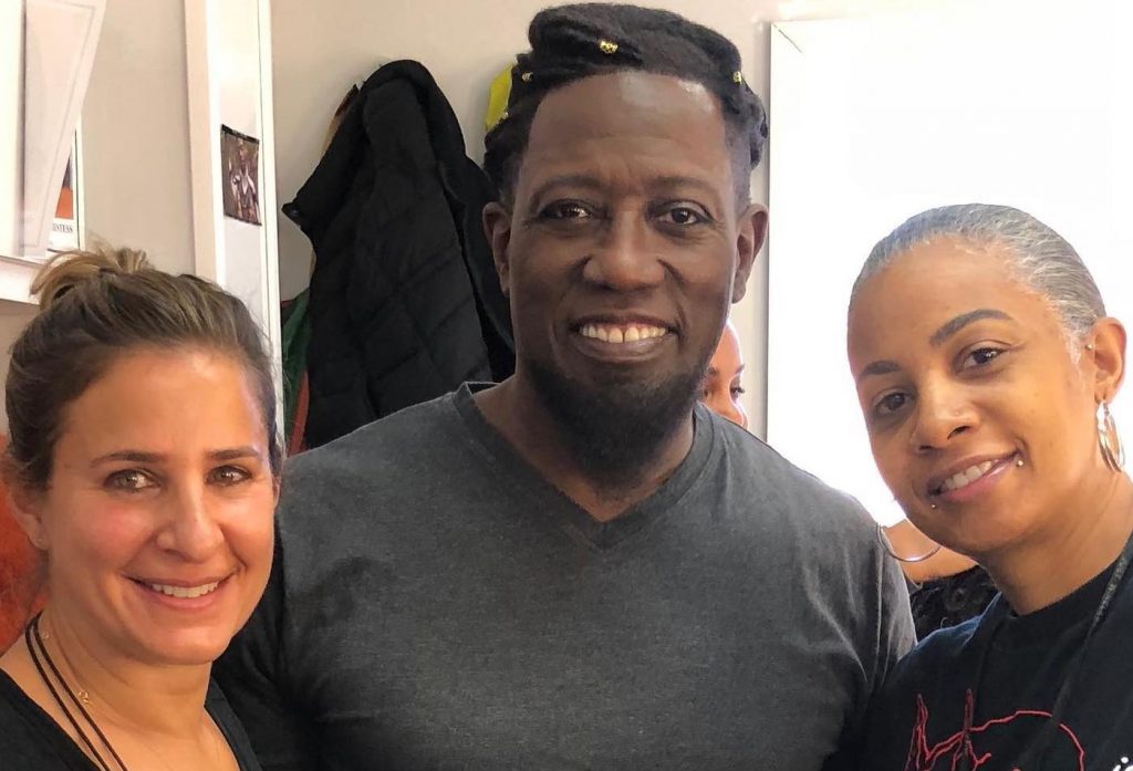 Hair department Vera Steimberg, Wesley Snipes, and hair department head Stacey Morris. 