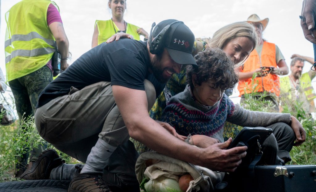 L-r, Director John Krasinski, Noah Jupe and Emily Blunt on the set of Paramount Pictures' "A Quiet Place Part II." Photo by Jonny Cournoyer. Courtesy Paramount Pictures.