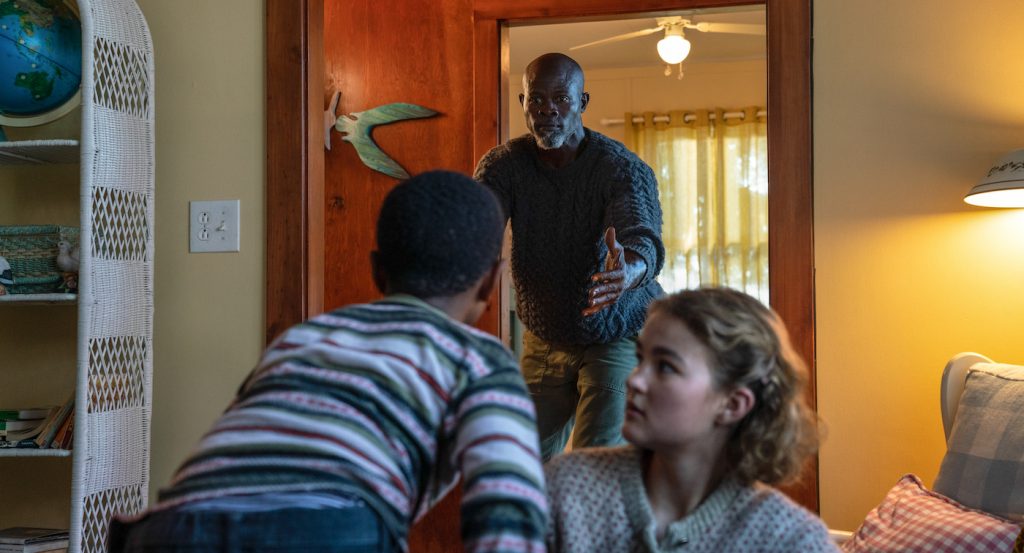 Man on Island (Djimon Hounsou) and Regan (Millicent Simmonds) brave the unknown in "A Quiet Place Part II." Photo by Jonny Cournoyer. Courtesy Paramount Pictures.