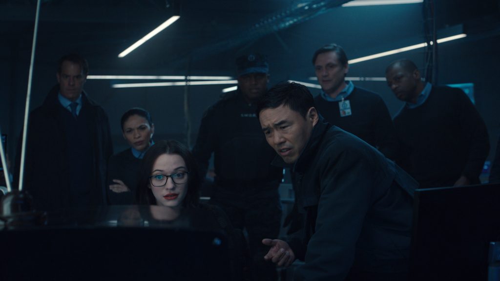 L-r: Kat Dennings as Darcy Lewis and Randall Park as Jimmy Woo in Marvel Studios' Wandavision. Photo courtesy of Marvel Studios.