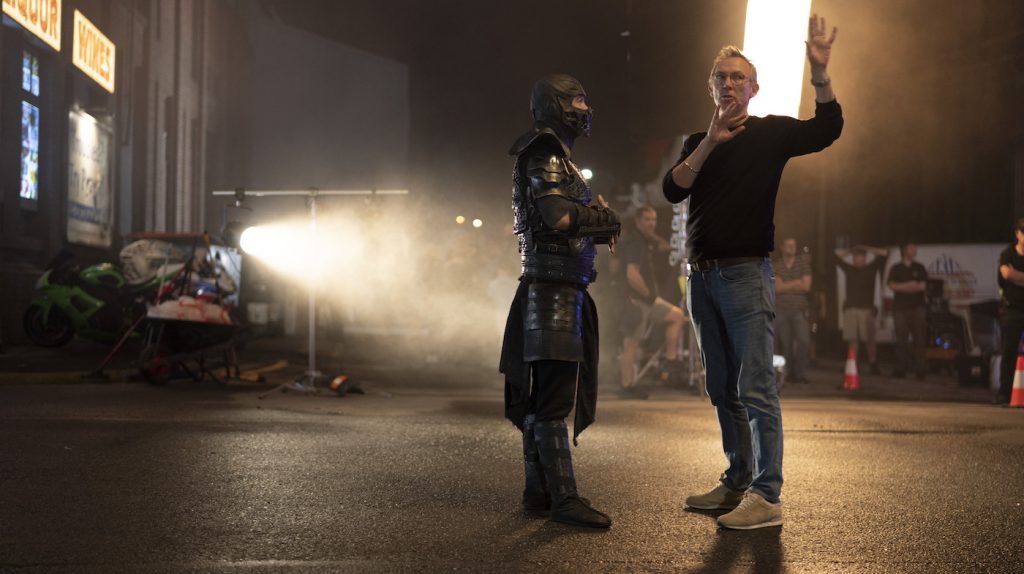 Caption: (L-r) JOE TASLIM and director/producer SIMON MCQUOID on the set of New Line Cinema’s action adventure “Mortal Kombat,” a Warner Bros. Pictures release. Photo Credit: Mark Rogers