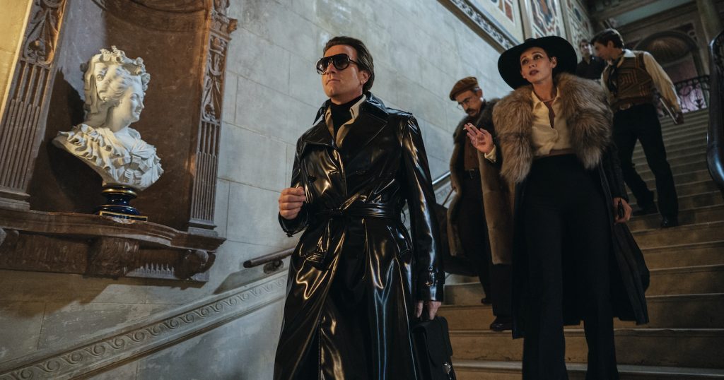 HALSTON (L to R) EWAN MCGREGOR as HALSTON, DAVID PITTU as JOE EULA, and REBECCA DAYAN as ELSA PERETTI in episode 102 of HALSTON Cr. ATSUSHI NISHIJIMA/NETFLIX © 2021