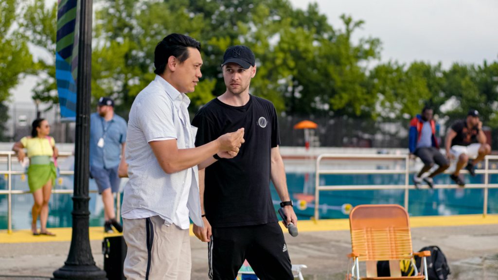 (L-r) Director JON M. CHU and choreographer CHRISTOPHER SCOTT on the set of Warner Bros. Pictures’ “IN THE HEIGHTS,” a Warner Bros. Pictures release. Courtesy Warner Bros.