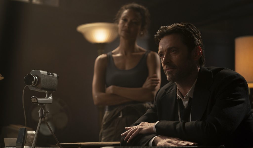 Caption: (L-r) THANDIWE NEWTON as Watts and HUGH JACKMAN as Nick Bannister in Warner Bros. Pictures’ action thriller “REMINISCENCE,” a Warner Bros. Pictures release. Photo Credit: Ben Rothstein