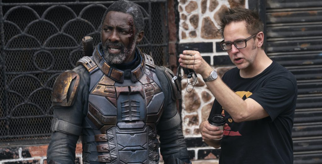 Caption: (L-r) IDRIS ELBA and writer/director JAMES GUNN on the set of Warner Bros. Pictures’ action adventure “THE SUICIDE SQUAD,” a Warner Bros. Pictures release. Photo Credit: Jessica Miglio/™ & © DC Comics