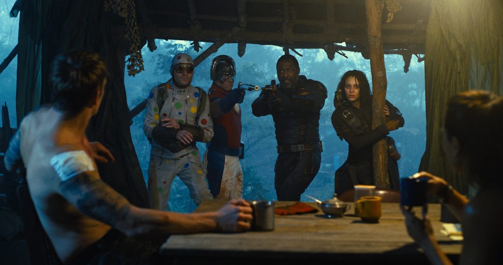 Caption: (L-r) JOEL KINNAMAN as Colonel Rich Flag, DAVID DASTMALCHIAN as Polka-Dot Man, JOHN CENA as Peacemaker, IDRIS ELBA as Bloodsport, DANIELA MELCHIOR as Ratcatcher 2 and ALICE BRAGA as Sol Soria in Warner Bros. Pictures’ superhero action adventure “THE SUICIDE SQUAD,” a Warner Bros. Pictures release. Photo Credit: Courtesy of Warner Bros. Pictures/™ & © DC Comics