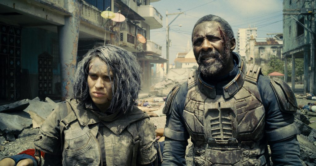 Caption: (L-r) DANIELA MELCHIOR as Ratcatcher 2 and IDRIS ELBA as Bloodsport in Warner Bros. Pictures’ superhero action adventure “THE SUICIDE SQUAD,” a Warner Bros. Pictures release. Photo Credit: Courtesy of Warner Bros. Pictures/™ & © DC Comics