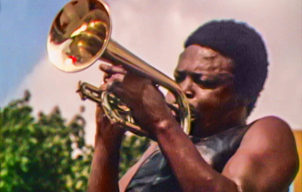 Hugh Masekela performs at the Harlem Cultural Festival in 1969, featured in the documentary SUMMER OF SOUL. Photo Courtesy of Searchlight Pictures. © 2021 20th Century Studios All Rights Reserved