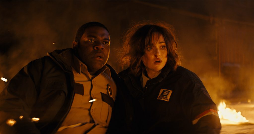 Sam Richardson and Milana Vayntrub in WEREWOLVES WITHIN. Courtesy IFC Films.