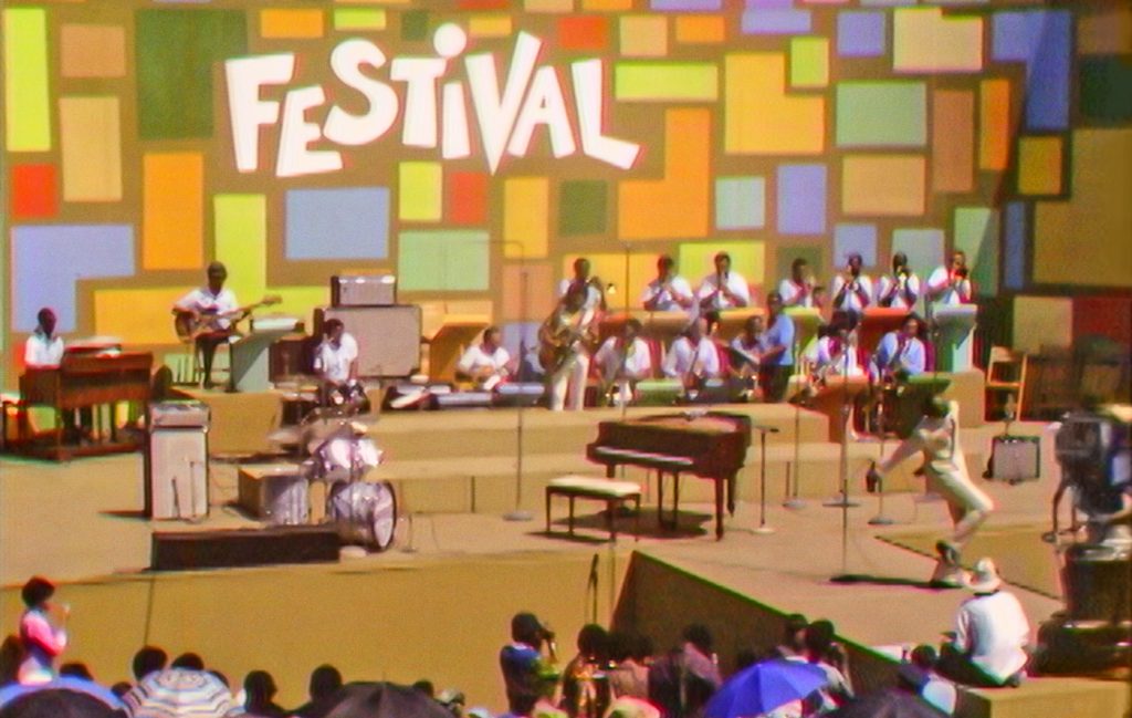 Tony Lawrence hosts the Harlem Cultural Festival in 1969, featured in the documentary SUMMER OF SOUL. Photo Courtesy of Searchlight Pictures. © 2021 20th Century Studios All Rights Reserved