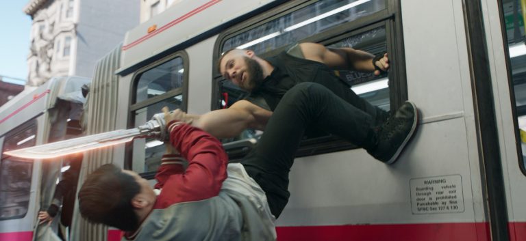 (L-R): Shang-Chi (Simu Liu) and Razor Fist (Florian Munteanu) in Marvel Studios' SHANG-CHI AND THE LEGEND OF THE TEN RINGS. Photo courtesy of Marvel Studios. ©Marvel Studios 2021. All Rights Reserved.
