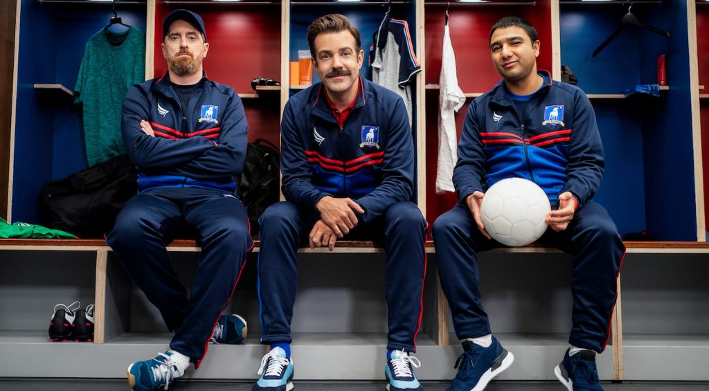 Brendan Hunt, Jason Sudeikis and Nick Mohammed in “Ted Lasso” season two, now streaming on Apple TV+.