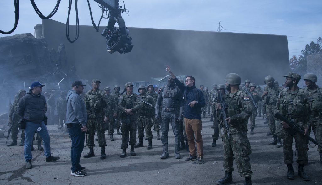 Caption: (Center) IDRIS ELBA and writer/director JAMES GUNN on the set of Warner Bros. Pictures’ action adventure “THE SUICIDE SQUAD,” a Warner Bros. Pictures release. Photo Credit: Jessica Miglio/™ & © DC Comics