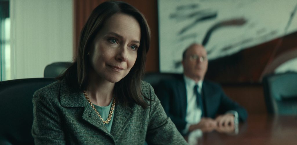 WORTH (2021) Amy Ryan as Camille Biros and Michael Keaton as Ken Feinberg. Cr: NETFLIX