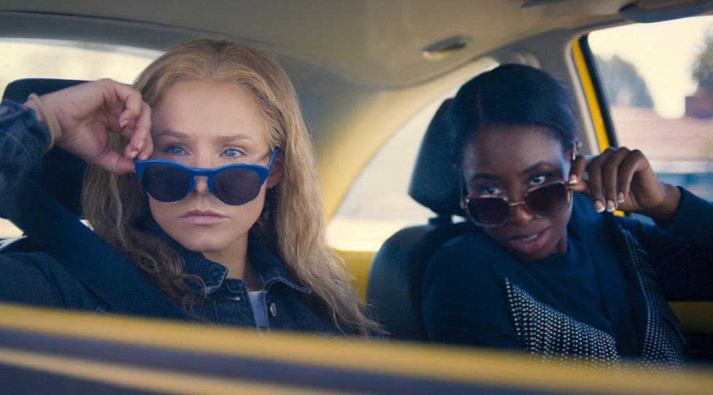 Kristen Bell as Connie Kaminski and Kirby Howell-Baptiste as JoJo Johnson in QUEENPINS. Credit: Courtesy STX Films