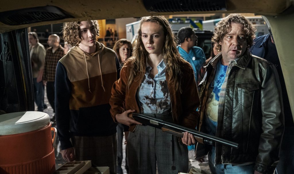 (from left) Cameron Elam (Dylan Arnold), Marion (Nancy Stephens, background), Allyson (Andi Matichak) and Lonnie Elam (Robert Longstreet) in Halloween Kills, directed by David Gordon Green. Photo Credit: Ryan Green/Universal Pictures