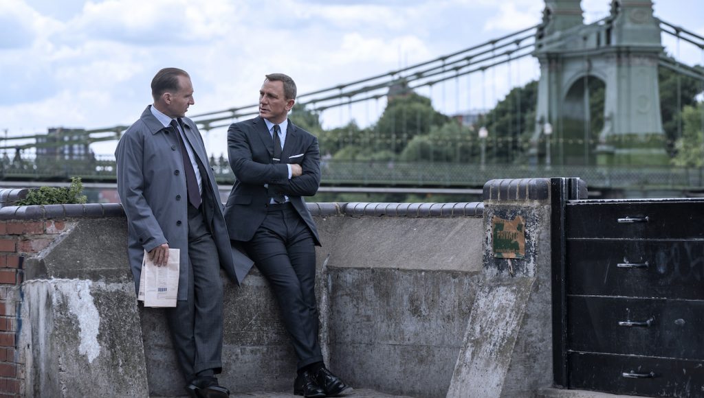 Ralph Fiennes stars as M and Daniel Craig as James Bond in NO TIME TO DIE, an EON Productions and Metro-Goldwyn-Mayer Studios film. Credit: Nicola Dove © 2021 DANJAQ, LLC AND MGM. ALL RIGHTS RESERVED.