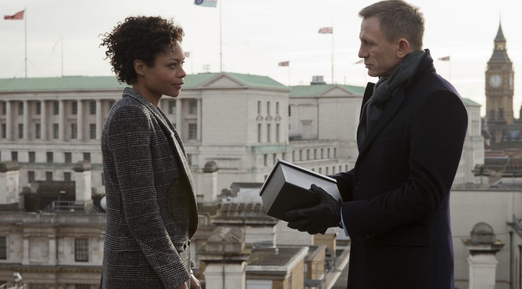 Eve (Naomie Harris) presents Bond (Daniel Craig) with a gift from M in Metro-Goldwyn-Mayer Pictures/Columbia Pictures/EON Productions’ action adventure SKYFALL. Photo by Francois Duhamel.