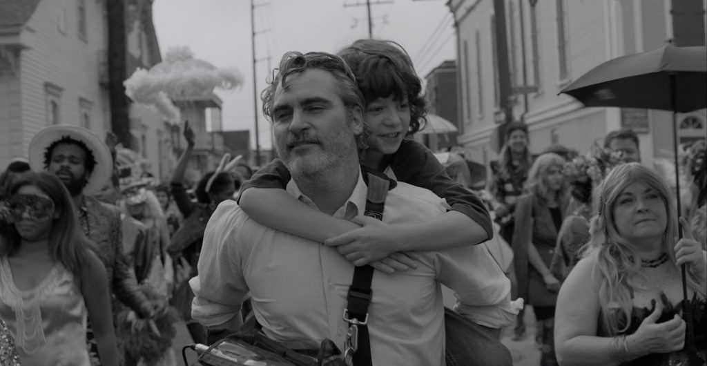 Joaquin Phoenix, Woody Norman (L-R). Courtesy of A24.