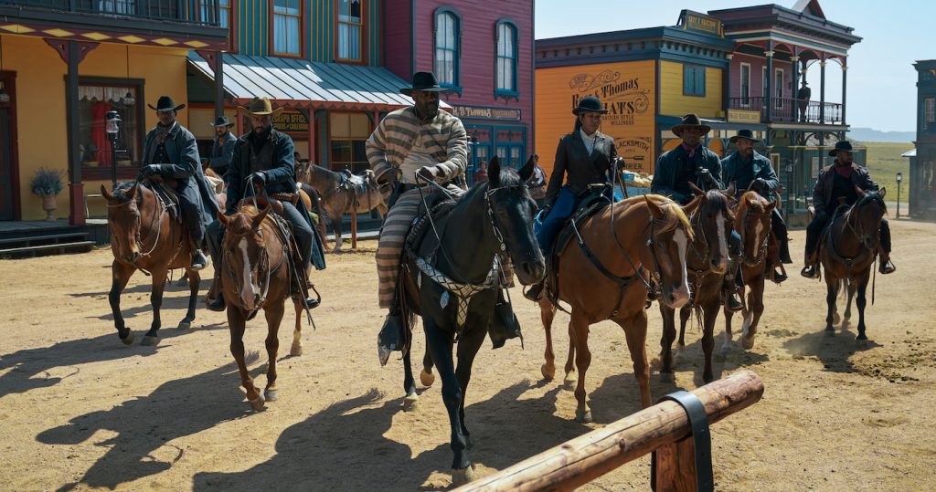 THE HARDER THEY FALL (L to R) (4th from Left): LAKEITH STANFIELD as CHEROKEE BILL, IDRIS ELBA as RUFUS BUCK, and REGINA KING as TRUDY SMITH in THE HARDER THEY FALL. CR: DAVID LEE/NETFLIX © 2021