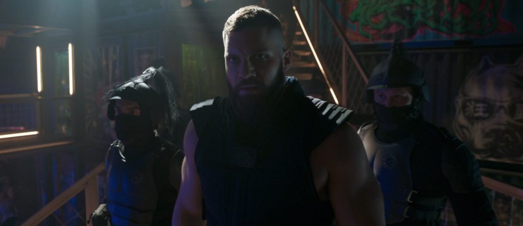 (Center): Razor Fist (Florian Munteanu) in Marvel Studios' SHANG-CHI AND THE LEGEND OF THE TEN RINGS. Photo courtesy of Marvel Studios. ©Marvel Studios 2021. All Rights Reserved.