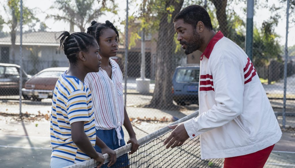 Caption: (L-r) DEMI SINGLETON as Serena Williams, SANIYYA SIDNEY as Venus Williams and WILL SMITH as Richard Williams in Warner Bros. Pictures’ inspiring drama “KING RICHARD,” a Warner Bros. Pictures release. Photo Credit: Chiabella James